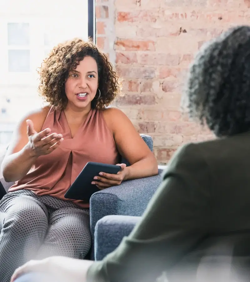 an image of a person getting advice from a woman